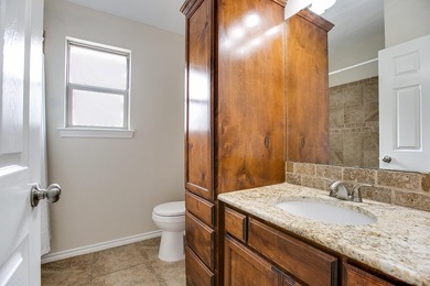 Discover this charming 3-bedroom, 2-bathroom home located in the - photo 24