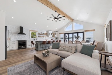 Brand new, turn-key luxury on Portage Lake. Wake up to - photo 2