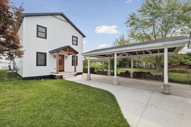 Brand new, turn-key luxury on Portage Lake. Wake up to - photo 3