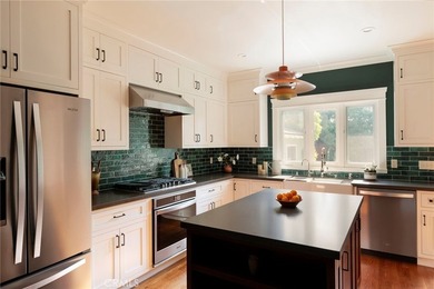 Welcome to 245 E. Lindero Avenue, an exceptional restored 1919 - photo 8