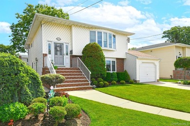 Welcome to 1989 Charles Street located in Bellmore on the - photo 1