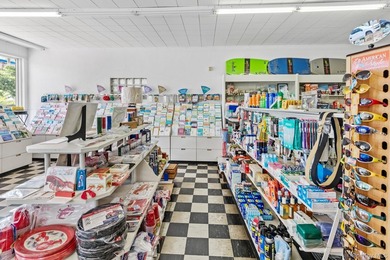 This remarkable commercial property, zoned *CB,* is located in - photo 8