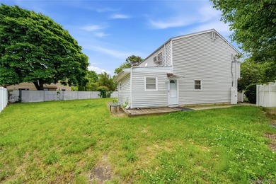 Welcome to this spacious hi-ranch in Bay Shore, offering endless - photo 26
