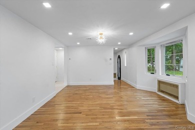 Welcome to this beautifully renovated Tudor, ideally located in - photo 12