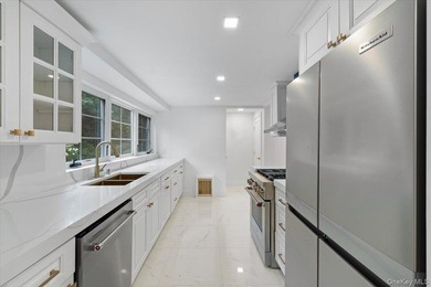 Welcome to this beautifully renovated Tudor, ideally located in - photo 17