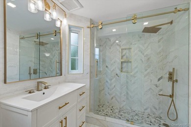 Welcome to this beautifully renovated Tudor, ideally located in - photo 35