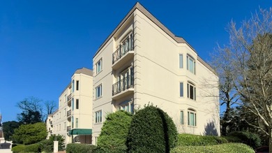 Desirable one-level living awaits in the admired Evian building