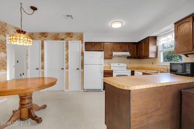 Nestled in the desirable, Adult Community of Lions Head North is - photo 6