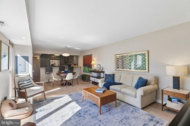Bright and beautifully appointed bi-level condominium in the - photo 1