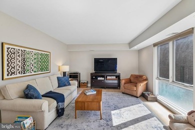 Bright and beautifully appointed bi-level condominium in the - photo 2