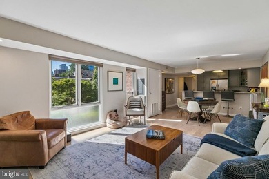 Bright and beautifully appointed bi-level condominium in the - photo 3