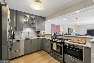 Bright and beautifully appointed bi-level condominium in the - photo 6