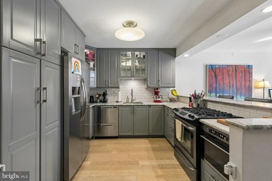 Bright and beautifully appointed bi-level condominium in the - photo 7