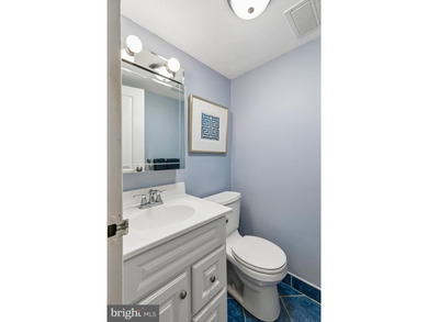 Bright and beautifully appointed bi-level condominium in the - photo 8