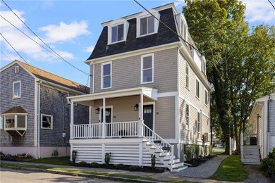 Thoughtfully renovated two-unit multi-family home with an - photo 1