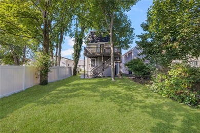 Thoughtfully renovated two-unit multi-family home with an - photo 2