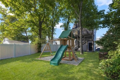 Thoughtfully renovated two-unit multi-family home with an - photo 3