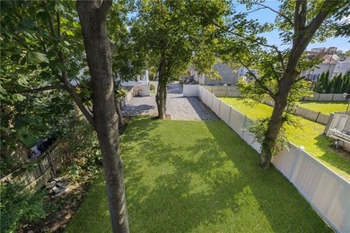 Thoughtfully renovated two-unit multi-family home with an - photo 4