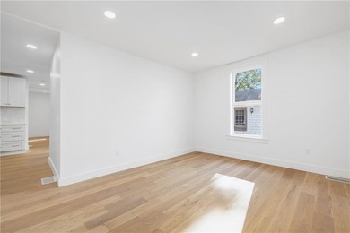 Thoughtfully renovated two-unit multi-family home with an - photo 8
