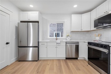 Thoughtfully renovated two-unit multi-family home with an - photo 10