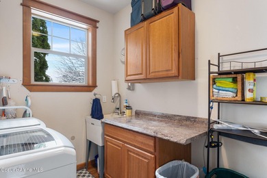 This charming 3-bedroom, 2-bath ranch-style home sits on a 1/4