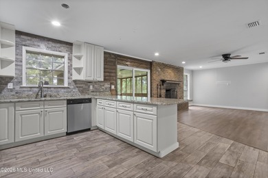 Enjoy waterfront living in this 3-bedroom, 2-bath home located - photo 12