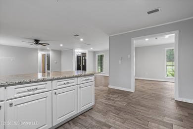 Enjoy waterfront living in this 3-bedroom, 2-bath home located - photo 13