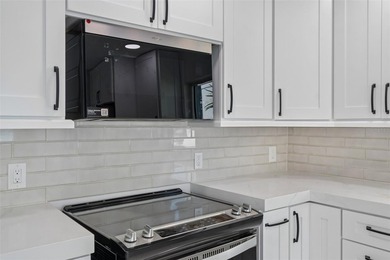 Price Improvement! Experience the pinnacle of refined waterfront - photo 14