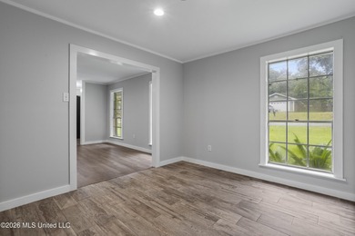Enjoy waterfront living in this 3-bedroom, 2-bath home located - photo 14