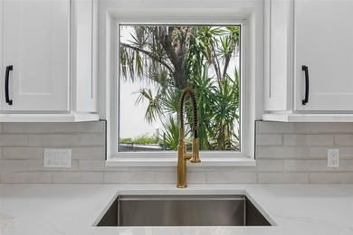 Price Improvement! Experience the pinnacle of refined waterfront - photo 15