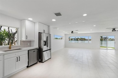 Price Improvement! Experience the pinnacle of refined waterfront - photo 16