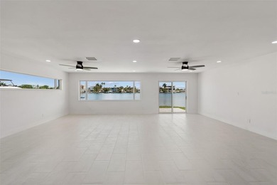 Price Improvement! Experience the pinnacle of refined waterfront - photo 17