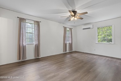 Enjoy waterfront living in this 3-bedroom, 2-bath home located - photo 17