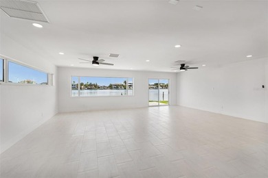 Price Improvement! Experience the pinnacle of refined waterfront - photo 18