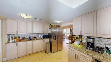Welcome to this beautifully refreshed pool home located in the - photo 18