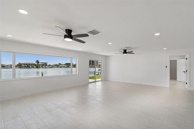 Price Improvement! Experience the pinnacle of refined waterfront - photo 19