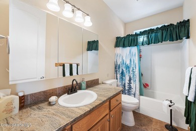 This charming 3-bedroom, 2-bath ranch-style home sits on a 1/4