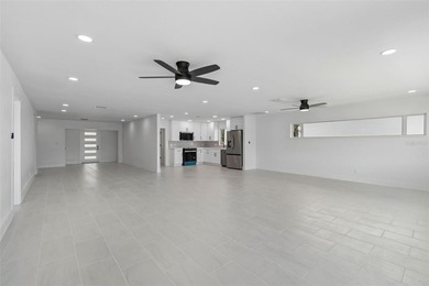 Price Improvement! Experience the pinnacle of refined waterfront - photo 22