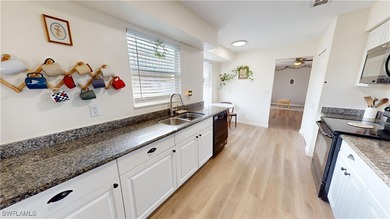 Welcome to 4207 SW 7th Ave in Cape Coral, a charming 3-bedroom - photo 3