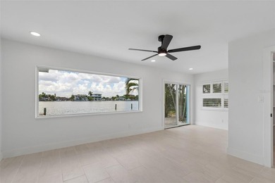 Price Improvement! Experience the pinnacle of refined waterfront - photo 24