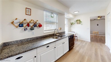 Welcome to 4207 SW 7th Ave in Cape Coral, a charming 3-bedroom - photo 5