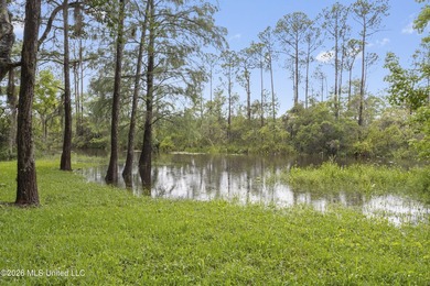 Enjoy waterfront living in this 3-bedroom, 2-bath home located - photo 27