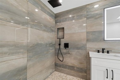 Price Improvement! Experience the pinnacle of refined waterfront - photo 29