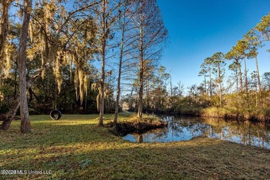 Enjoy waterfront living in this 3-bedroom, 2-bath home located - photo 31