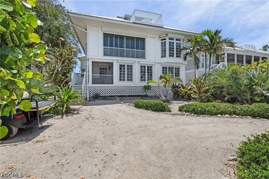 #128 *Twin Shores Cottage* is ideally positioned on the coveted - photo 40