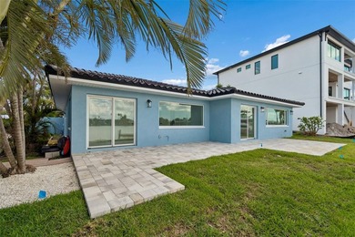 Price Improvement! Experience the pinnacle of refined waterfront - photo 43