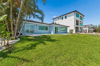 Price Improvement! Experience the pinnacle of refined waterfront - photo 45