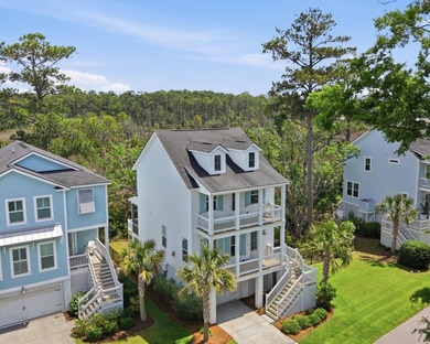 Welcome to this stunning elevated marsh front home on The Island - photo 4