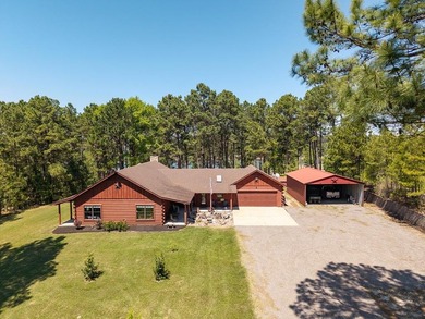 Looking for the country cozy charm of a Satterwhite Log Home on - photo 1
