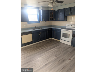 INVESTOR ALERT! Brand NEW Roof! This home could be great for a - photo 4